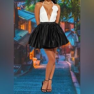 Fabulous Pearl and roses halter back dress. This piece is a sure head turner.SzL